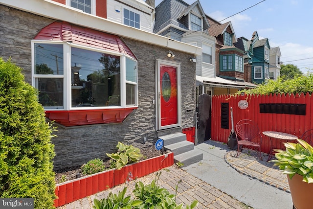 5509 Chew Ave, Philadelphia, PA 19138 - townhome / multi-family property with entry steps, stone siding, and a residential view