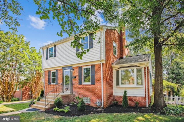 5909 Frederick St, Springfield, VA 22150 - colonial house with a chimney and brick siding