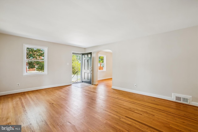 5909 Frederick St, Springfield, VA 22150 - unfurnished room featuring arched walkways and light wood-style flooring