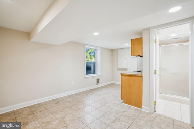 5909 Frederick St, Springfield, VA 22150 - kitchen featuring light countertops, recessed lighting, and light tile patterned flooring