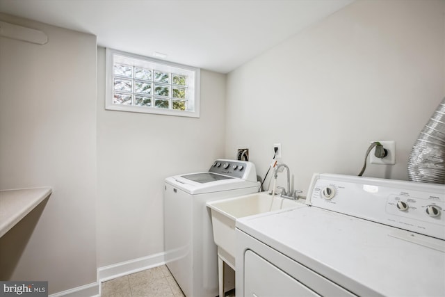 5909 Frederick St, Springfield, VA 22150 - laundry area featuring separate washer and dryer and baseboards