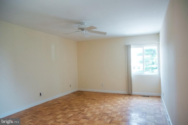 16 Stonehenge Cir Unit 16-5, Baltimore, MD 21208 - empty room featuring a ceiling fan and baseboards