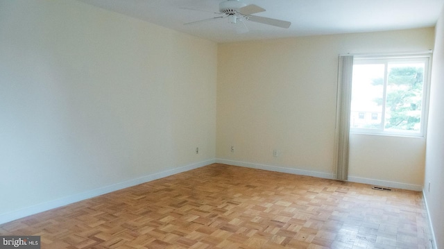 16 Stonehenge Cir Unit 16-5, Baltimore, MD 21208 - spare room with ceiling fan and baseboards
