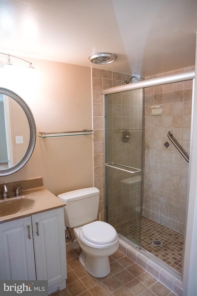 16 Stonehenge Cir Unit 16-5, Baltimore, MD 21208 - full bathroom with vanity, tile patterned flooring, and a shower stall