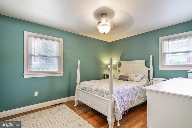 14 Nicholson Dr, Pasadena, MD 21122 - bedroom with dark wood finished floors and ceiling fan