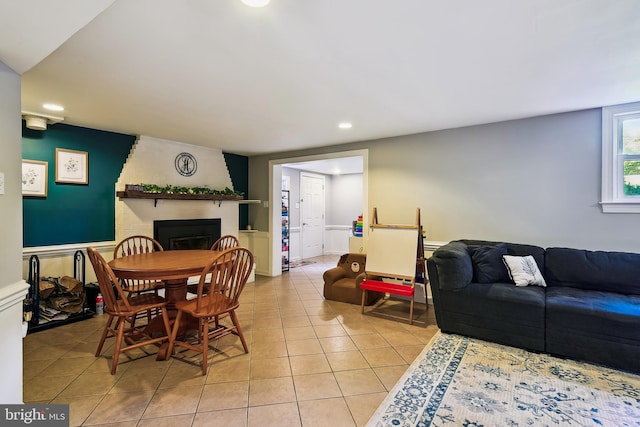 14 Nicholson Dr, Pasadena, MD 21122 - dining space featuring light tile patterned floors, recessed lighting, and a fireplace