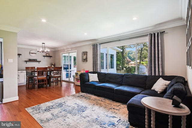 14 Nicholson Dr, Pasadena, MD 21122 - living area with ornamental molding, a chandelier, healthy amount of natural light, wood finished floors, and recessed lighting