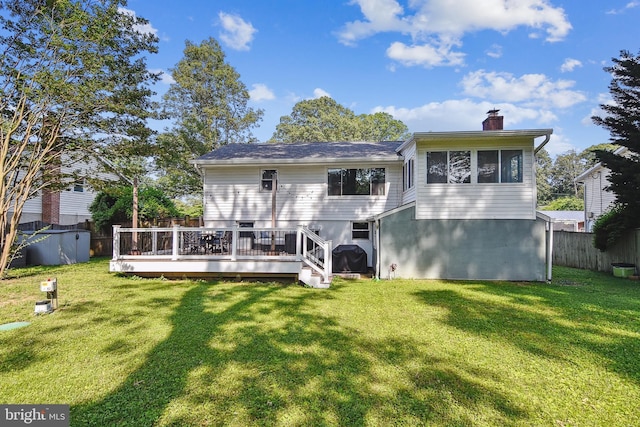 14 Nicholson Dr, Pasadena, MD 21122 - rear view of property featuring a chimney and a deck