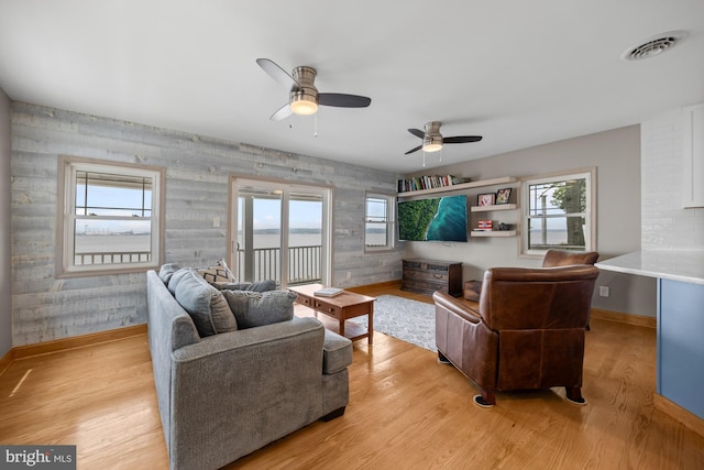1 Risner Ave, Penns Grove, NJ 08069 - living room featuring ceiling fan, healthy amount of natural light, and light wood-style floors
