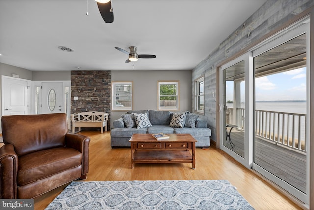 1 Risner Ave, Penns Grove, NJ 08069 - living area featuring a ceiling fan, light wood-style flooring, and a water view