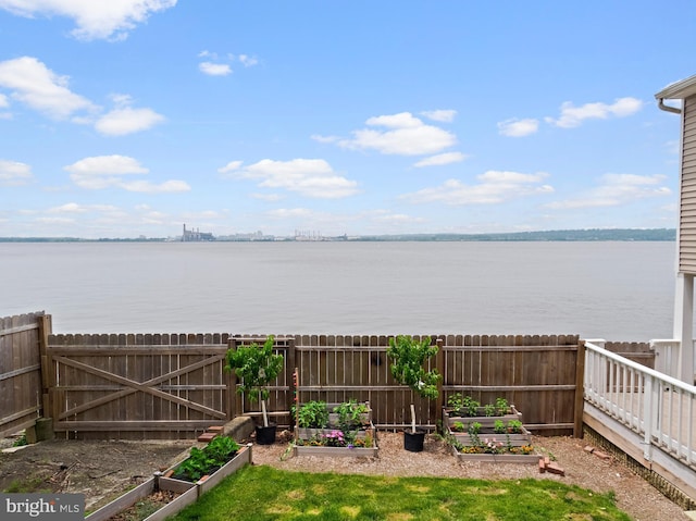 1 Risner Ave, Penns Grove, NJ 08069 - fenced backyard featuring a vegetable garden and a water view
