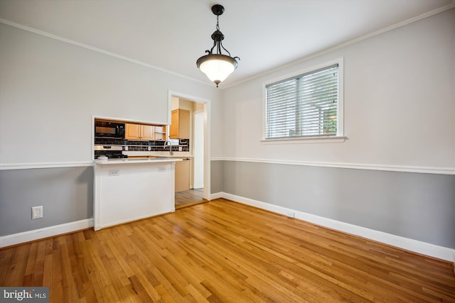 2013 Dayton St, Silver Spring, MD 20902 - unfurnished dining area with ornamental molding and light wood-type flooring
