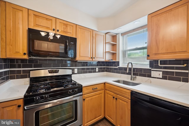 2013 Dayton St, Silver Spring, MD 20902 - kitchen with black appliances, backsplash, light stone counters, and open shelves