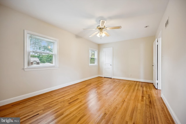 2013 Dayton St, Silver Spring, MD 20902 - unfurnished bedroom featuring light wood-type flooring, a ceiling fan, and a closet