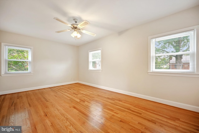 2013 Dayton St, Silver Spring, MD 20902 - unfurnished room featuring plenty of natural light, light wood finished floors, and a ceiling fan