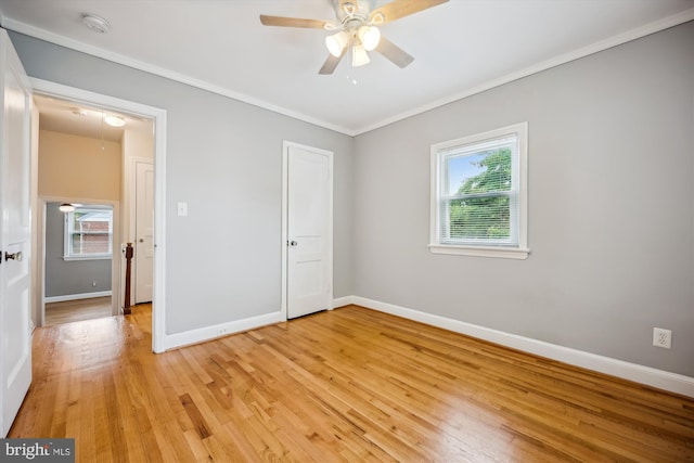 2013 Dayton St, Silver Spring, MD 20902 - unfurnished bedroom featuring ornamental molding, light wood finished floors, and ceiling fan