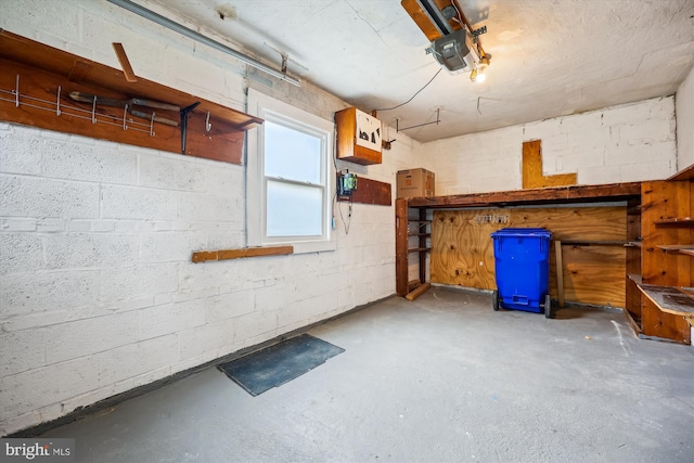 2013 Dayton St, Silver Spring, MD 20902 - garage with a garage door opener and concrete block wall