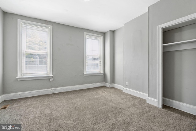 2006 N Mascher St, Philadelphia, PA 19122 - unfurnished bedroom featuring carpet floors, multiple windows, and a closet