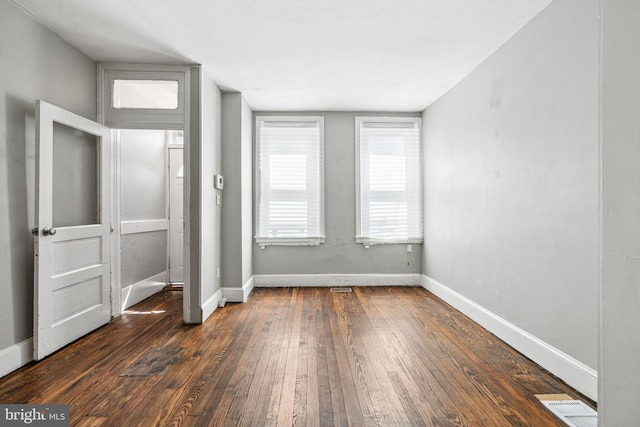 2006 N Mascher St, Philadelphia, PA 19122 - unfurnished bedroom featuring dark wood finished floors and baseboards