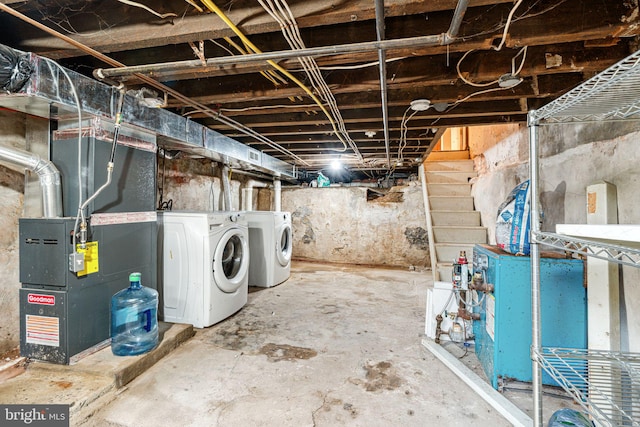 2006 N Mascher St, Philadelphia, PA 19122 - unfinished basement with independent washer and dryer, heating unit, and a heating unit