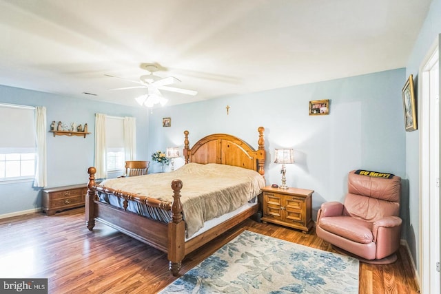 1016 Wiltshire Dr, La Plata, MD 20646 - bedroom featuring multiple windows, wood finished floors, and a ceiling fan