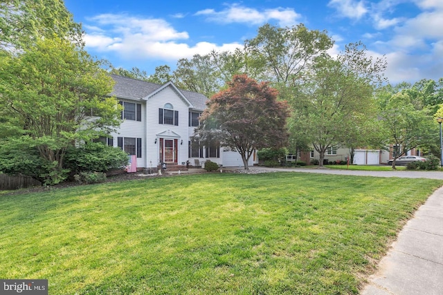 1016 Wiltshire Dr, La Plata, MD 20646 - colonial inspired home with a front lawn and a shingled roof