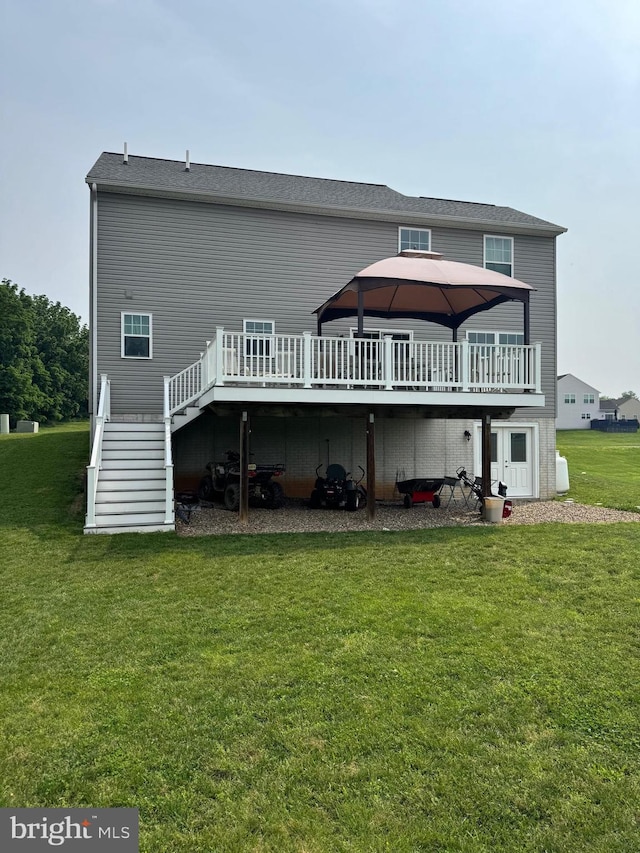 635 Queensbury Dr, Chambersburg, PA 17202 - back of house with stairs, a deck, and a lawn