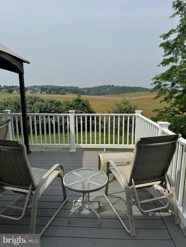 635 Queensbury Dr, Chambersburg, PA 17202 - wooden deck featuring a view of countryside