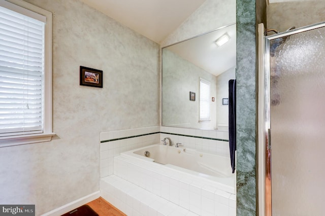 2912 Weaver Rd, Lancaster, PA 17601 - full bathroom with lofted ceiling, a garden tub, a stall shower, and wood finished floors