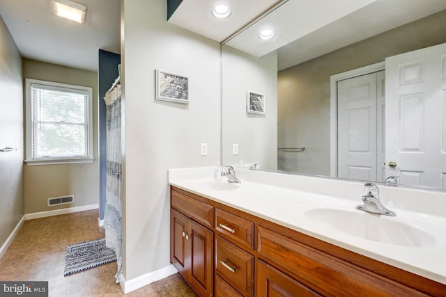 2912 Weaver Rd, Lancaster, PA 17601 - bathroom with baseboards and double vanity