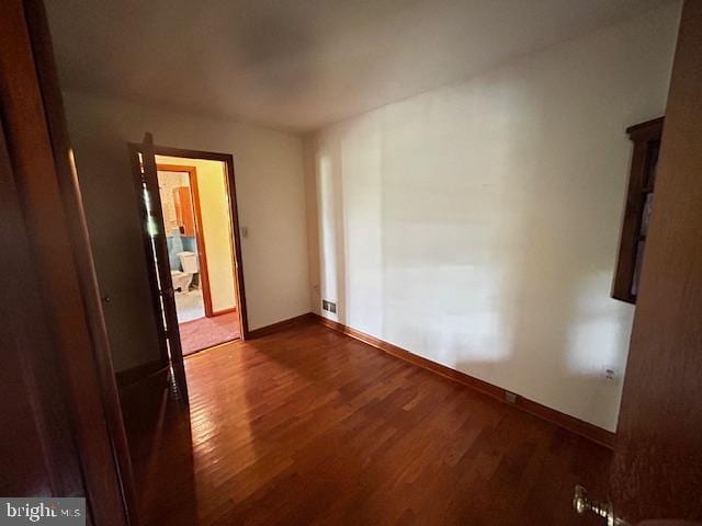 2304 Front Royal Pike, Winchester, VA 22602 - empty room with wood finished floors and baseboards