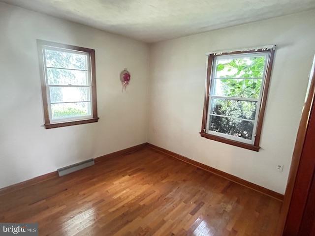 2304 Front Royal Pike, Winchester, VA 22602 - unfurnished room featuring light wood-style flooring and a baseboard heating unit