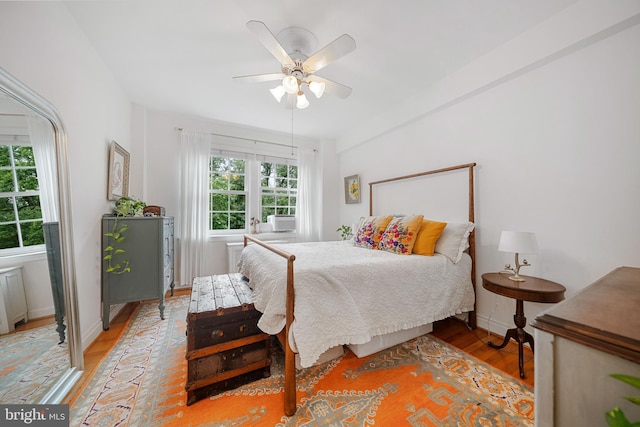 2737 Devonshire Pl NW Unit 321, Washington, DC 20008 - bedroom with wood finished floors, a ceiling fan, and cooling unit