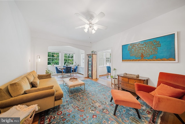 2737 Devonshire Pl NW Unit 321, Washington, DC 20008 - living room with ceiling fan, wood finished floors, and arched walkways