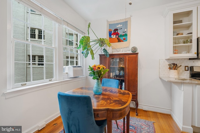 2737 Devonshire Pl NW Unit 321, Washington, DC 20008 - dining area with baseboards and wood-type flooring