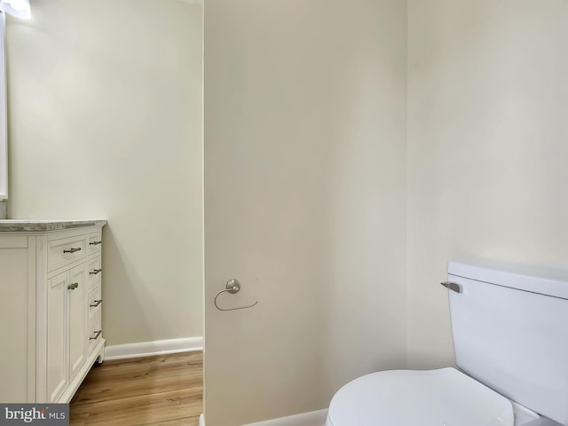 4421 Eastwinds, Chincoteague Island, VA 23336 - half bath featuring wood finished floors and vanity