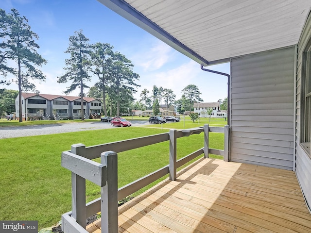 4421 Eastwinds, Chincoteague Island, VA 23336 - deck with a residential view and a lawn