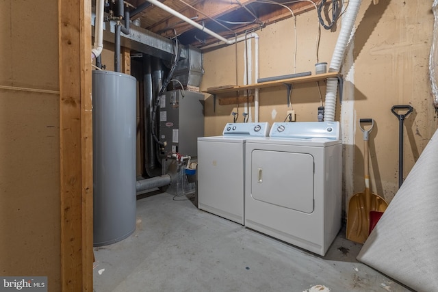 12803 Climbing Ivy Dr, Germantown, MD 20874 - unfinished basement featuring water heater, washer and clothes dryer, and heating unit