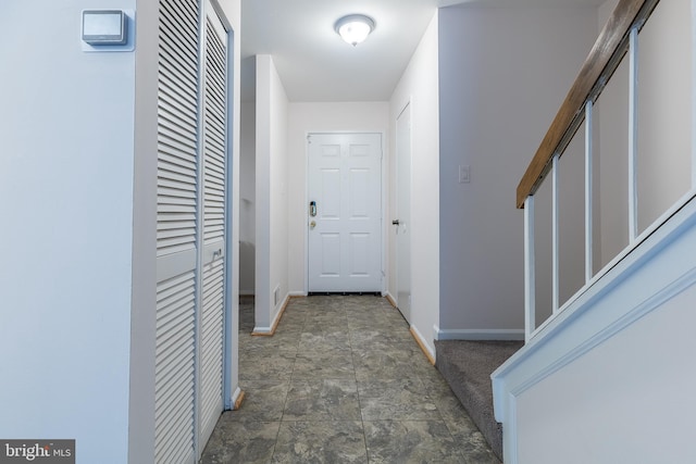12803 Climbing Ivy Dr, Germantown, MD 20874 - corridor with baseboards and stone finish flooring