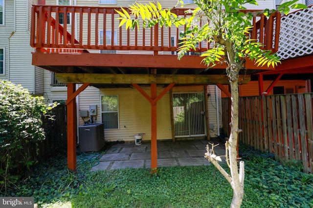 12803 Climbing Ivy Dr, Germantown, MD 20874 - rear view of house featuring a wooden deck and a patio area