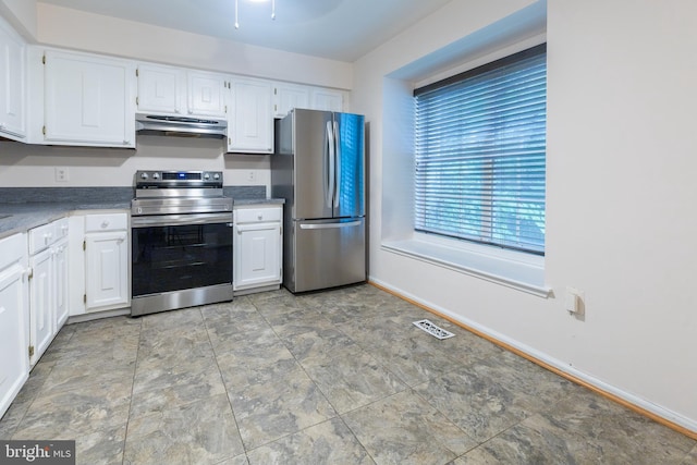 12803 Climbing Ivy Dr, Germantown, MD 20874 - kitchen featuring stainless steel appliances, extractor fan, white cabinetry, stone finish flooring, and dark countertops