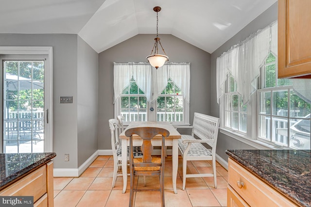 2413 Taylor Ave, Alexandria, VA 22302 - dining space featuring healthy amount of natural light, vaulted ceiling, and light tile patterned floors