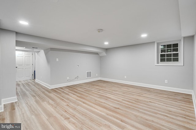 2413 Taylor Ave, Alexandria, VA 22302 - finished basement featuring light wood finished floors and recessed lighting