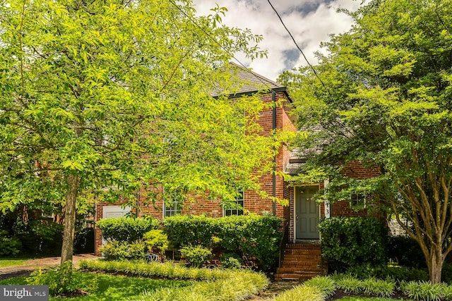 2413 Taylor Ave, Alexandria, VA 22302 - view of property hidden behind natural elements with brick siding