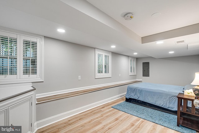 2413 Taylor Ave, Alexandria, VA 22302 - bedroom with light wood-style floors, electric panel, recessed lighting, and multiple windows