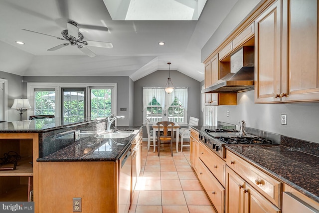 2413 Taylor Ave, Alexandria, VA 22302 - kitchen featuring wall chimney exhaust hood, appliances with stainless steel finishes, vaulted ceiling, dark stone counters, and light tile patterned floors