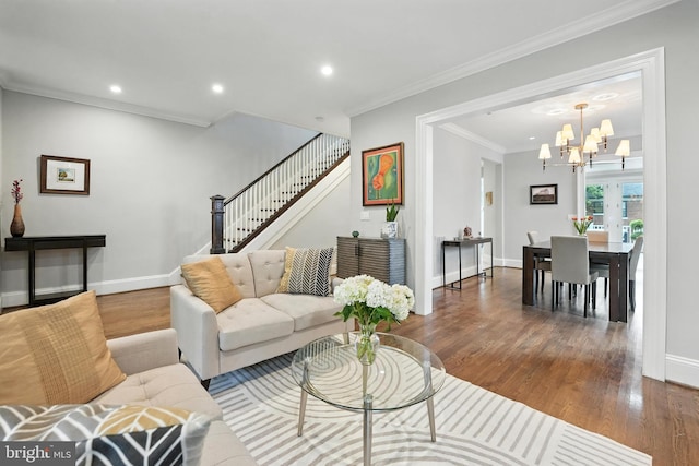 3831 Fulton St NW, Washington, DC 20007 - living room featuring a chandelier, wood finished floors, stairs, ornamental molding, and recessed lighting