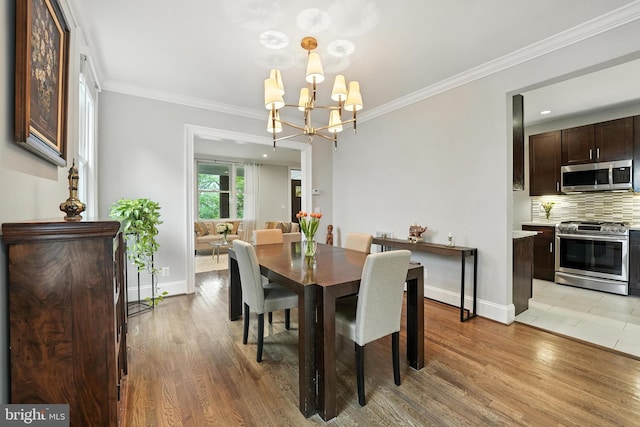 3831 Fulton St NW, Washington, DC 20007 - dining room with a chandelier, ornamental molding, light wood-type flooring, and recessed lighting