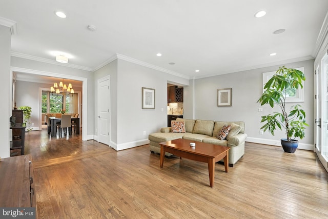 3831 Fulton St NW, Washington, DC 20007 - living area featuring a chandelier, wood finished floors, recessed lighting, and crown molding