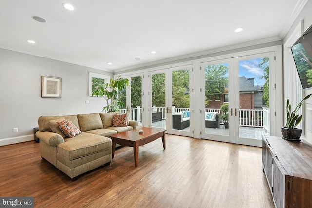 3831 Fulton St NW, Washington, DC 20007 - living room with french doors, crown molding, wood finished floors, and recessed lighting